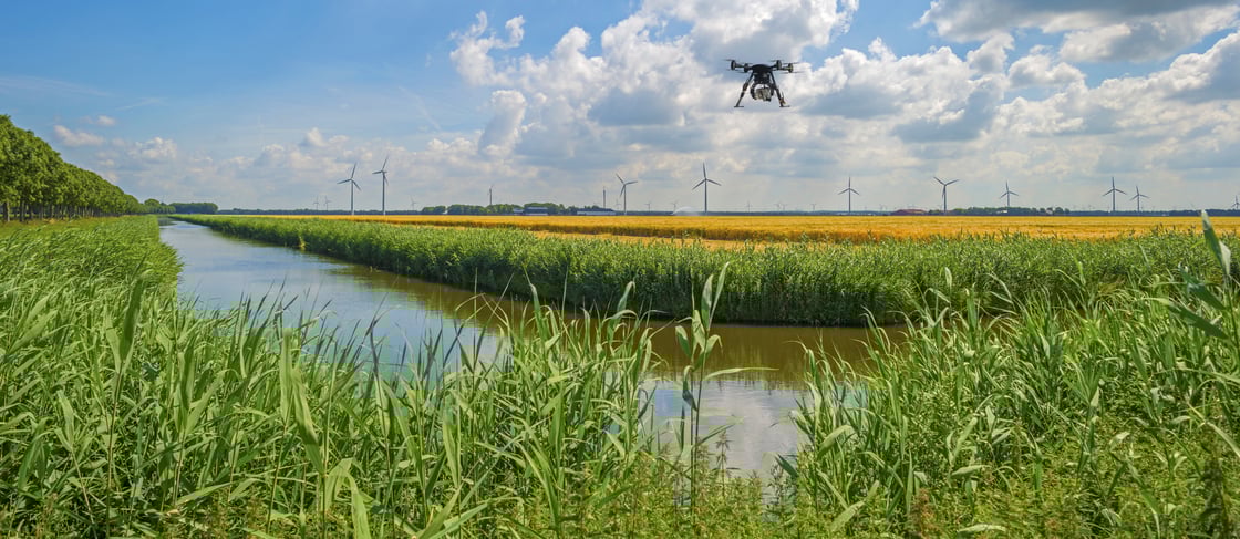 Agriculture_water_mills_orchard_trees_irrigation_field_photoshop DRONE-iStock-498398888
